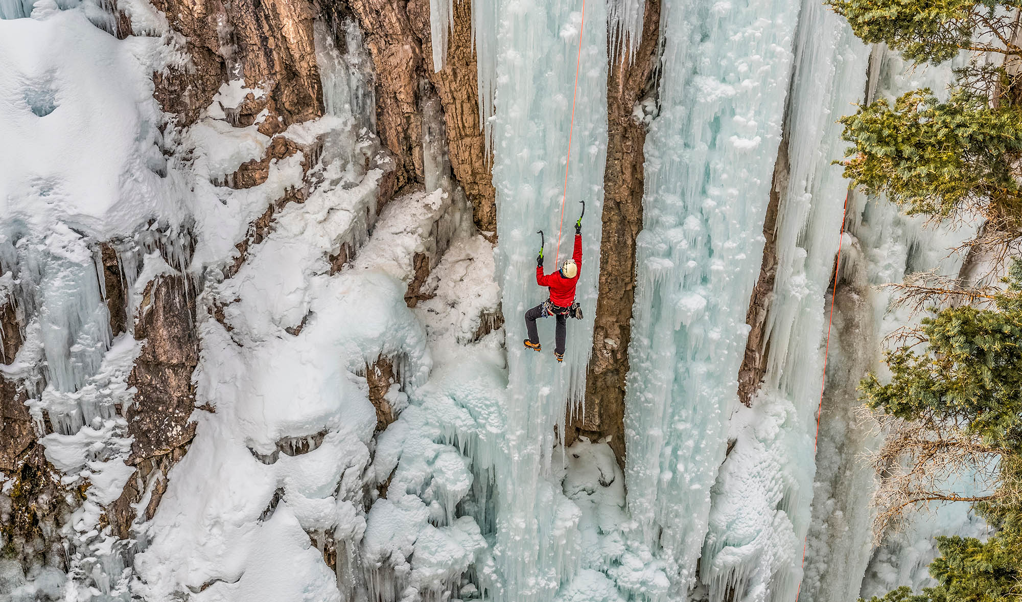 Ice climber ascending